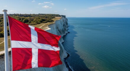 Waving Danish Flag (Dannebrog) Symbolizing Nordic History Against the White Chalk Cliffs of Møns Klint