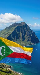 Waving Comorian Flag Representing Island Unity Against the Volcanic Coastal Landscape of the Archipelago