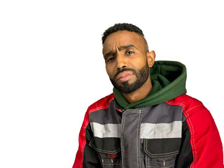 Portrait of a thoughtful, serious young man of African-American nationality with a beard close-up....