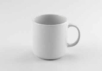 Fototapeta premium A simple white ceramic mug with a handle on a white background in a studio setting for product photography