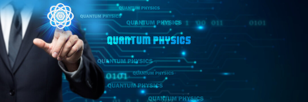 Businessman interacting with a glowing atom icon, representing Quantum Physics. Futuristic digital interface with binary code, symbolizing advanced science, research, and technological breakthroughs