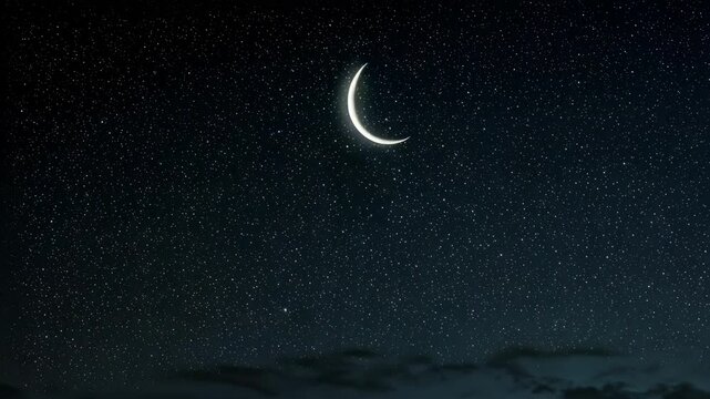New crescent moon shining in the night sky