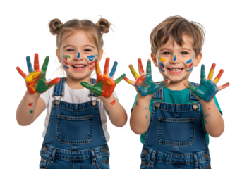 Two joyful children in overalls, faces and hands smeared with colorful paint, enthusiastically showing their hands in a fun and creative moment. isolated on white or transparent background. PNG