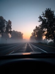 Fog Blankets the Road at Dawn, Creating a Mystical and Serene Driving Experience Along a Quiet Stretch of Highway Generative AI