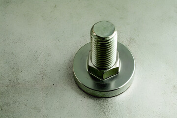 Steel Bolt with Washer on Grunge Metal Surface – Industrial Fastener Close-Up
