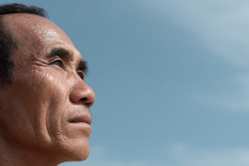 portrait of loader captured on left side of frame showcasing concentrated expression