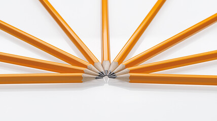 sharpened yellow graphite pencils arranged in a fan on white background. Perfect for school...