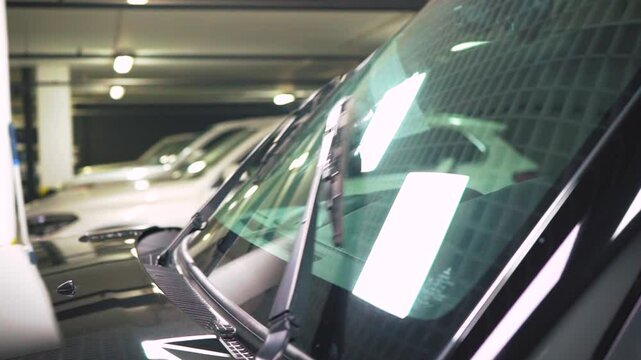 Close-up of car wipers without water injection, car dealership.