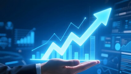 Hand holding a glowing upward trending chart with bars and line in a futuristic blue setting