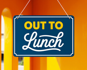 Out to Lunch sign hanging on a vibrant background.