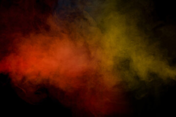 Fototapeta premium Orange and red steam on a black background.