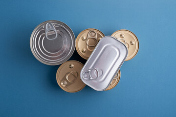 Unopened tin cans with various preserves. Fast food concept