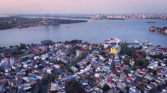 Stunning drone shot of Kochi city (also known as Cochin) in Kerala, India. It is a major port city & Often called the "Queen of the Arabian Sea, famous for Colonial architectures.