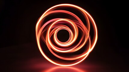 Luminous Swirl: A mesmerizing light painting showcases a radiant vortex of glowing lines against a dark canvas, evoking energy.