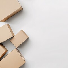 Cardboard shipping boxes scattered on a white background, flat lay composition symbolizing delivery, packaging, and logistics
