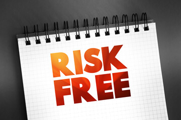 Risk Free text quote on notepad, concept background