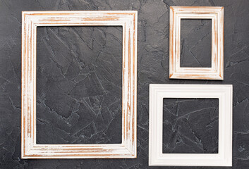 white wooden photo frames on black background