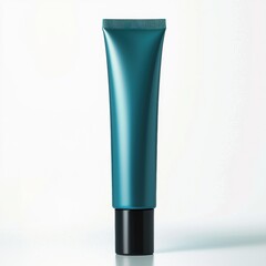 Close-up of a sleek teal and black cosmetic tube standing upright on a light background, highlighting modern packaging for skincare or beauty products