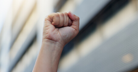 Hands, person and fist for protest outdoor for justice, government change and fighting for human...