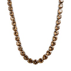 Obraz premium Adorn Yourself with a Polished Topaz Tennis Necklace Boasting Open Prong Gem Settings for Radiance