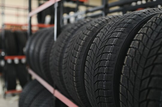 New car tire is placed on the tire storage rack in the tire factory. Be prepared for vehicles that need to change tires