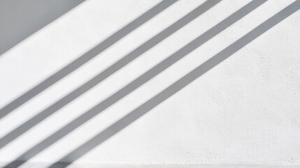 Minimalist abstract composition with shadows on textured white wall for modern design inspiration
