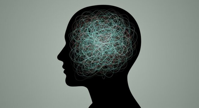 Abstract image of a side profile with random tangled lines in place of the brain.