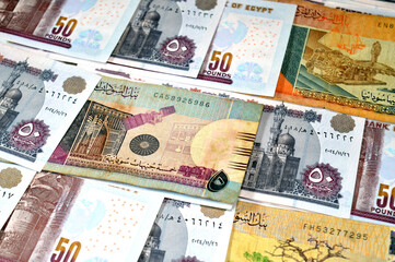 Sudanese pounds cash money bills banknotes and Pile of Egypt money  thousands of Pounds currency banknotes bills of 50 EGP LE, Egyptian money exchange rate, economy status, money concept