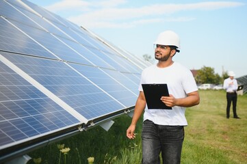 Indian Engineer near solar panel