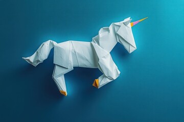 White origami unicorn with a colorful horn on a blue background, showcasing detailed paper folds and a playful, imaginative mood