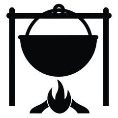 Black silhouette of cauldron over campfire, cooking over open flame outdoors
