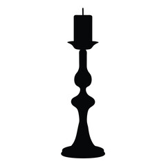 Elegant silhouette of a lit candle in a decorative candlestick holder