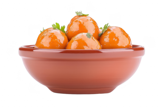 Bowl of glossy, orange gulab jamun garnished with fresh herbs, creating delicious and inviting dessert presentation