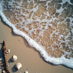 Close-up view of gentle ocean waves washing over sandy beach shoreline with seas and driftwood, captu the calming and natural beauty of the seaside environment