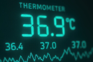 Fototapeta premium Digital thermometer display with temperature reading and monitoring graph in industry for precise inspection and control of conditions
