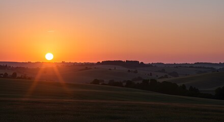 Golden Sunset Over Rolling Hills Landscape in Countryside