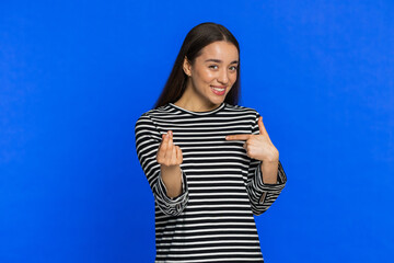 Give me money please. Caucasian young woman rubbing fingers show cash gesture demands to pay back...
