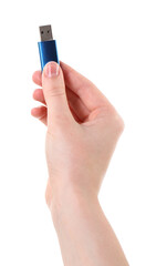 Woman holding usb flash drive on white background, closeup