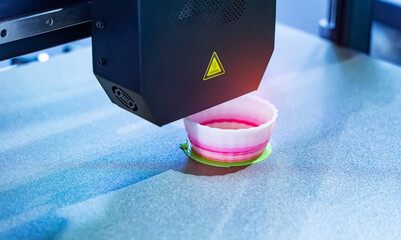 3D printer or additive manufacturing and robotic automation technology.