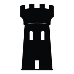 Fototapeta premium Silhouette of an imposing castle tower with battlements and a small entrance