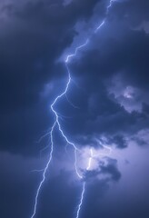 lightning bolt striking through a cloudy sky