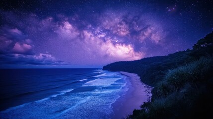 Obraz premium Night sky ablaze over a serene beach