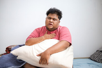 Fat Man With Lung Ache at Home in Bed, Chest Pain and Cough