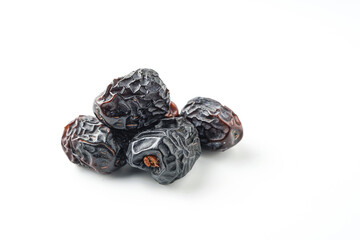 Dates fruit ajwa or kurma ajwa, isolated on white background