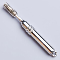 Sleek Silver Metal Comb with Spiral Handle on Gray Background