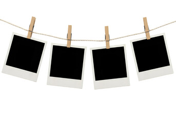 A row of five Polaroid frames pinned on a rope with clothespins, showcasing simplicity and an anticipation of cherished memories, isolated on white or transparent background. PNG