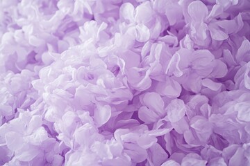 Fototapeta premium Close-up view of delicate, purple flower-like fabric textures.