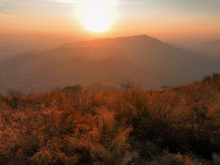 Beautiful sunset over mountains during autumn in a serene natural landscape