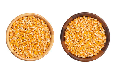 Top view of raw yellow corn kernels in wooden bowl on transparent background