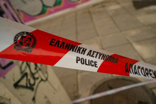 police tape from Geece , greek police ribbon  in the streets of Thessaloniki